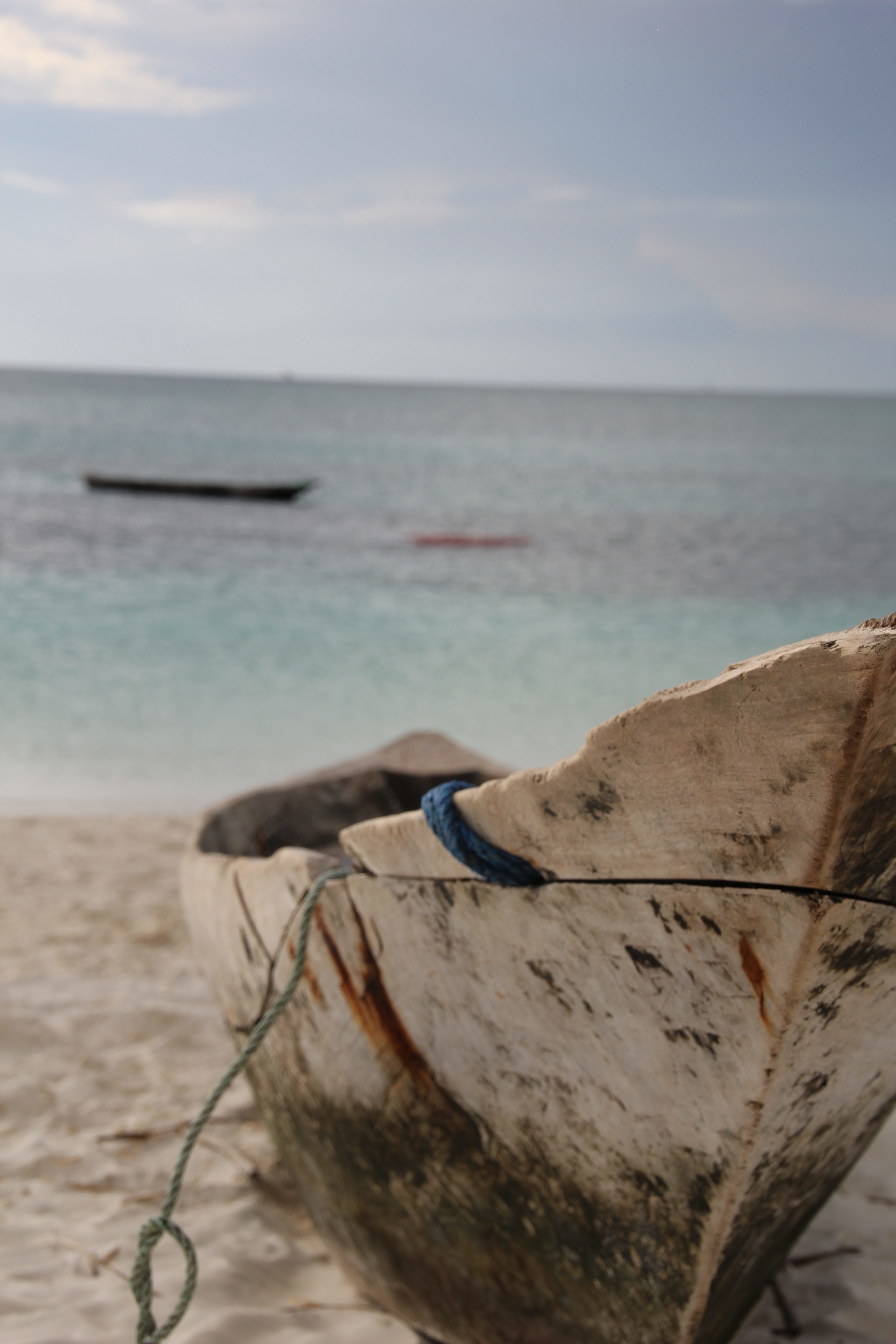 Traditional wodden boat on the beach in Zanzibar